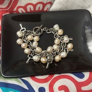 Silver key and pearl charm bracelet
